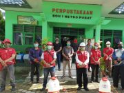 SD N 1 Metro Pusat Bersama PMI Kota Metro Lakukan Penyemprotan Disinfektan