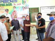 Pemkab Lamtim Serahkan Sertifikat Tanah Kepada Masyarakat