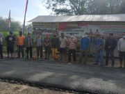 Pj Kepala dan Aparatur Tiyuh Penumangan Lakukan Penyemprotan Desinfektan