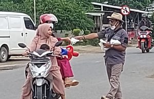 Trader Peduli Indonesia Kota Metro Bagi 5000 Masker KN95