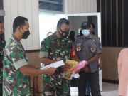 Trader Peduli Indonesia Bersama Kodim 0411/KM Salurkan Minyak Goreng Lewat Vaksinasi