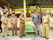 Pj Bupati Serahkan Mesin Pencacah Makanan Ternak