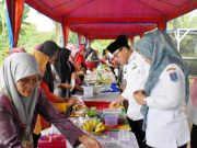 Wali Kota Metro Hadiri Acara Royokan Makan Bersama Warga Metro Selatan